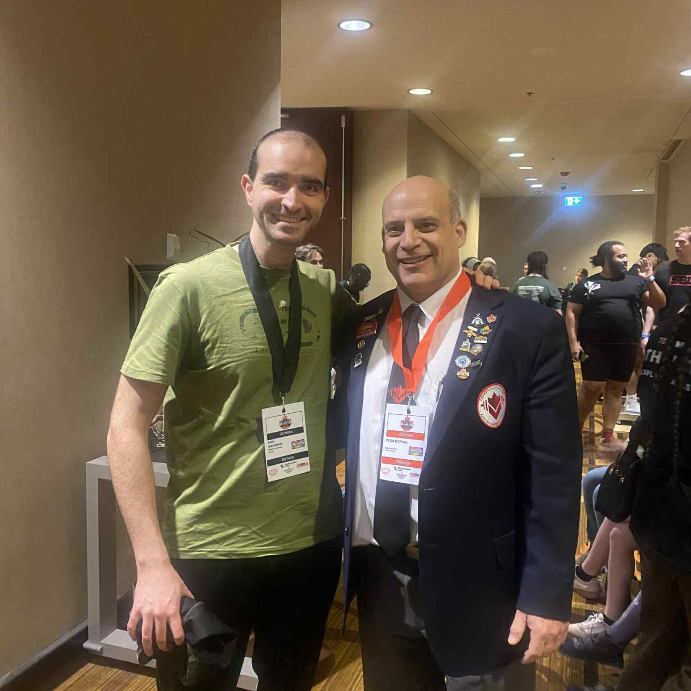 Tyler and a male special Olympian,